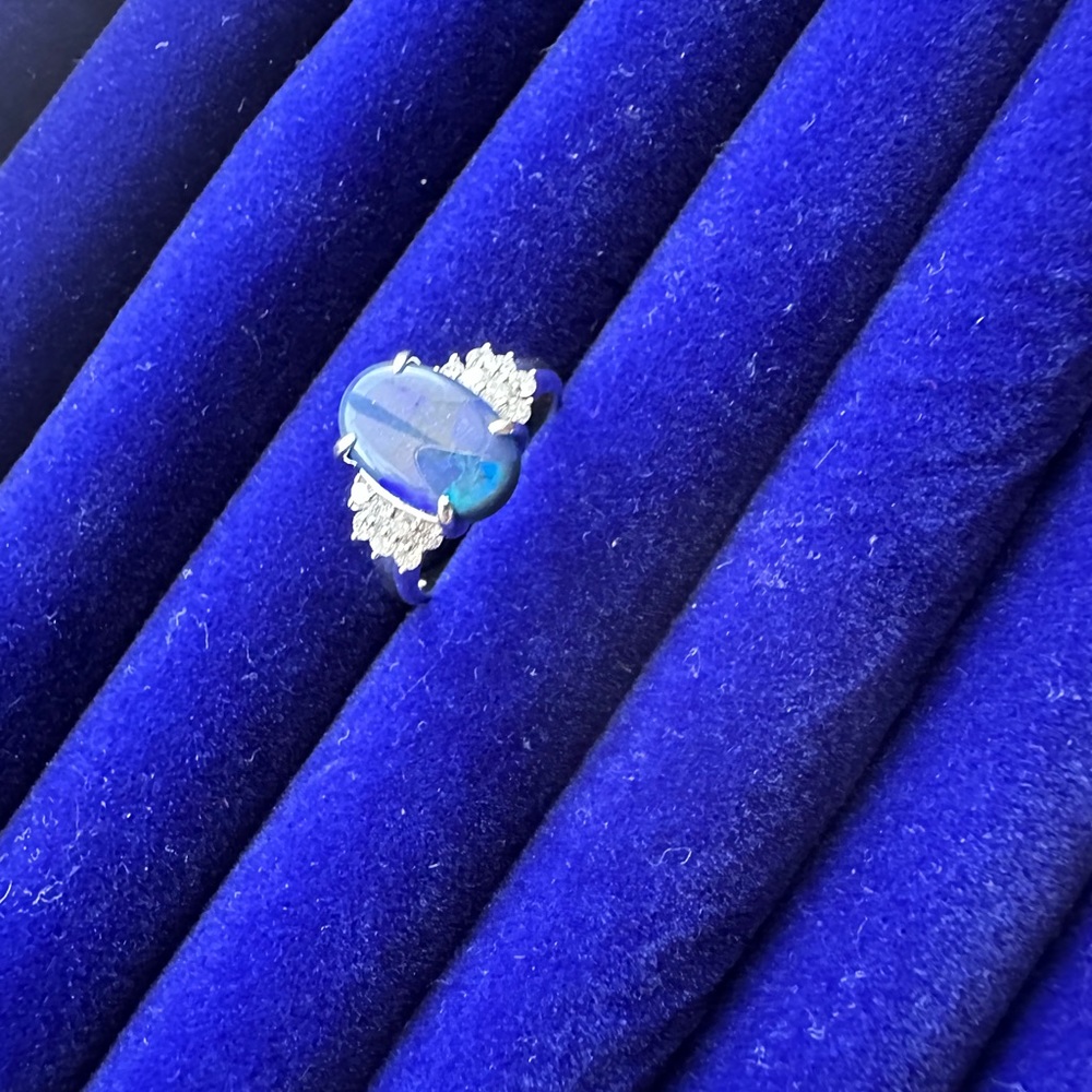 2.79 carats Black Opal with .32 carats total diamonds in Platinum 900 Size 6